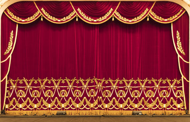 Obraz premium The theatrical curtain is red. Presentation. Cinema.