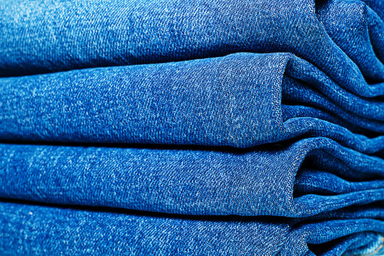 Jeans folded in the closet.
