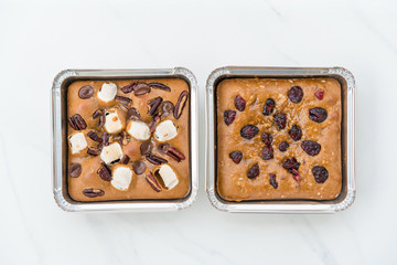 Chocolate Brownies on white marble background.