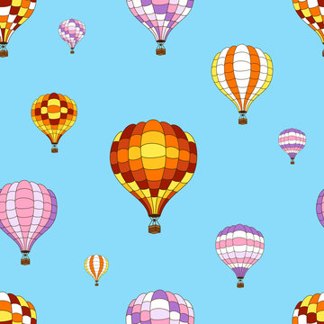 Vector seamless pattern from colorful hot air balloons on blue sky background