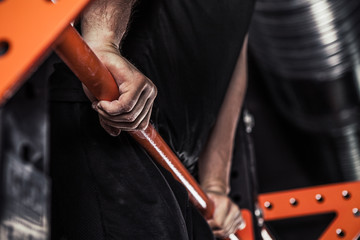 Man's hands closeup doing  pulling up