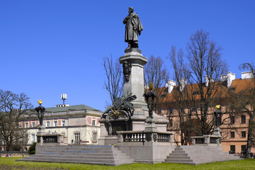 Fototapeta na wymiar Warsaw, Poland - Historic quarter of Warsaw old town - witer and poet Adam Mickiewicz monument at Krakowskie Przedmiescie street