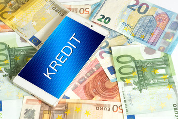 Ein Handy, Kredit und viele Euro Geldscheine