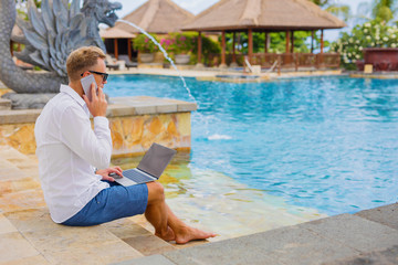 Businessman working while on vacation