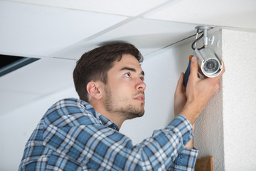 adjusting the CCTV position