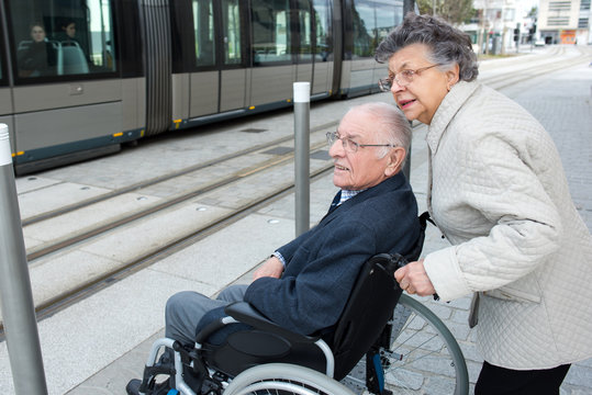 senior couple in wheelchair