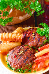 grilled bullets with croquettes and vegetables