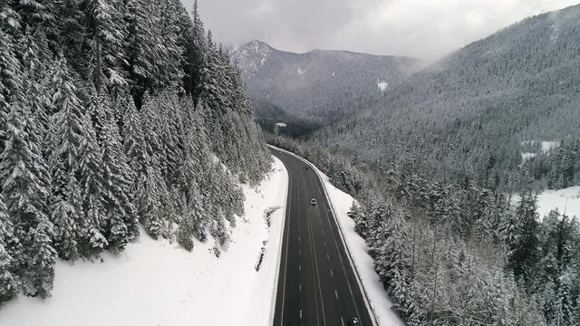 Epic Mountain Highway Aerial in Fresh Winter Snow