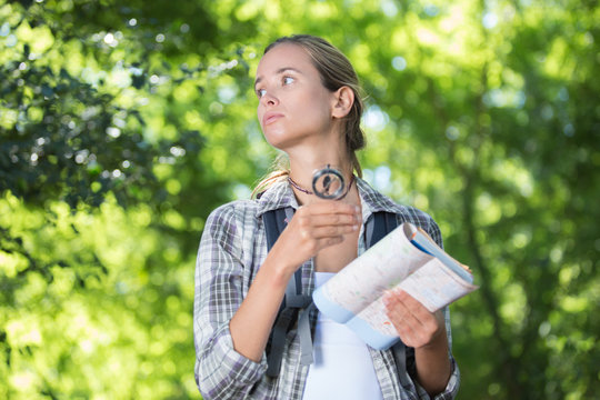 Female Hiker Deciding Which Path To Take