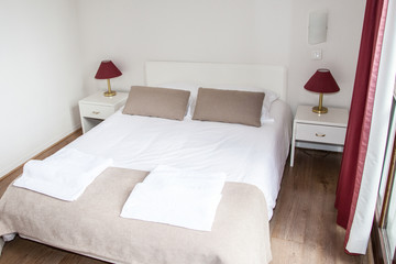 Double Bed In The Bedroom in hotel or resort place for holidays or vacation