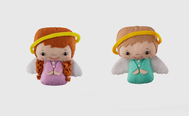 angel of felt on a light background. Handmade, interior toy
