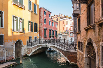 Fototapeta na wymiar Colorful canal in the city of Venice in Italy