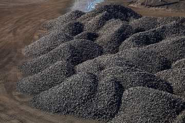 Large piles of processed Manganese rich ore rock