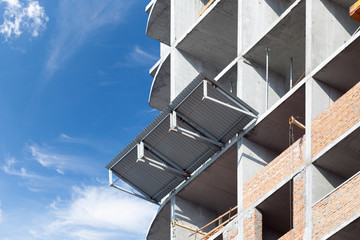 Construction of a new multi-storey building. Protection against falling stones from height