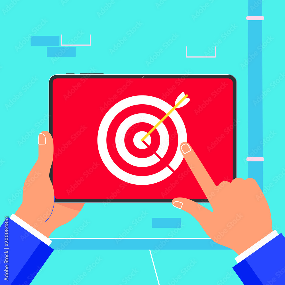 Poster hand holding black tablet device isolated on wall background. pad tablet in human hands with target 