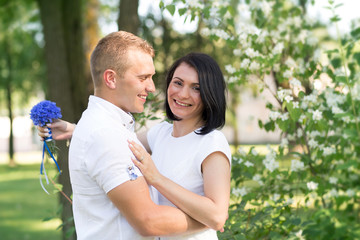 Fototapeta premium in love with the bride and groom in the park in the summer 