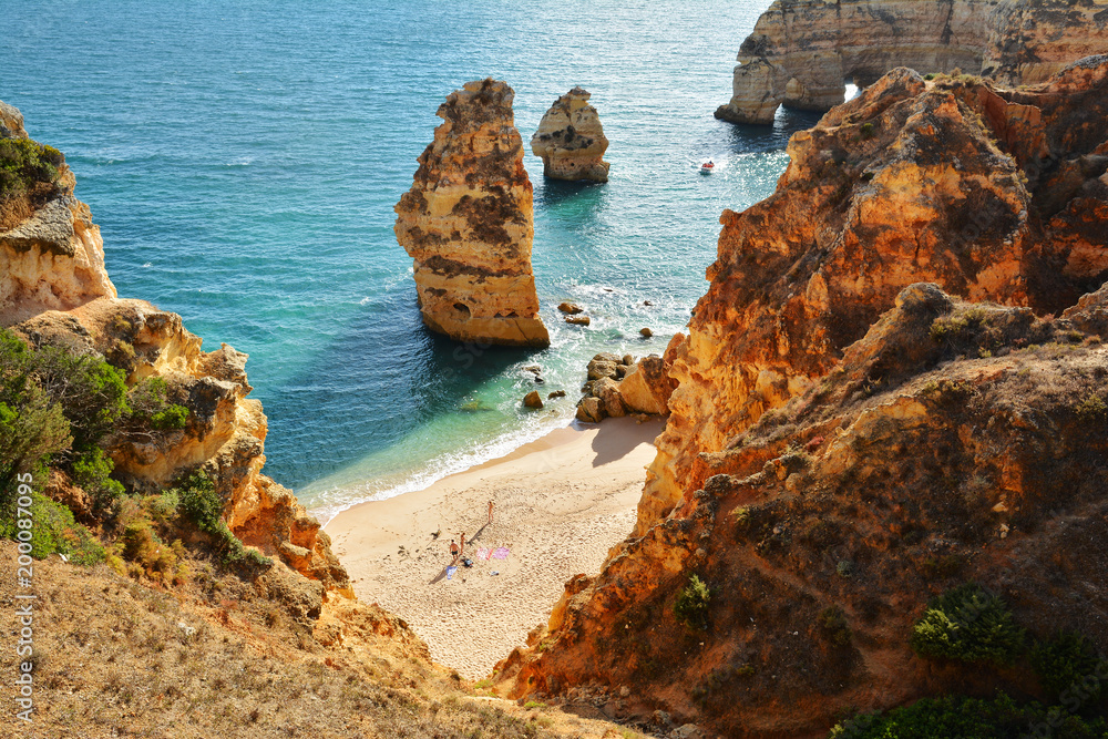 Sticker Algarve beach and rocks, amazing destination in Portugal and  all seasons attraction for many tourists in entire world