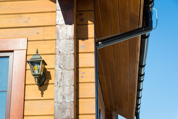 Drainage of a wooden house. Technology.Communications. Building.