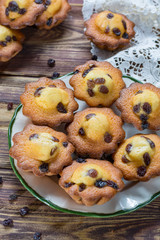 Traditional homemade French butter muffins stars with raisins, tasty dessert, top view