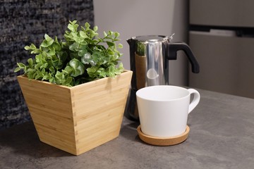 Coffee Cup with Pot on The Table