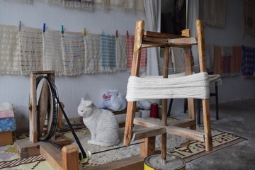 Loom. Weaving machine with a cat. Turkey