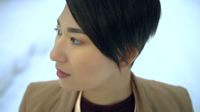 Korean girl looking into the camera close-up1-1