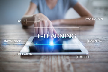 E-Learning on the virtual screen. Internet education concept.