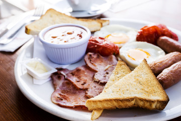 Egg and Toast - classical english breakfast with egg and ham