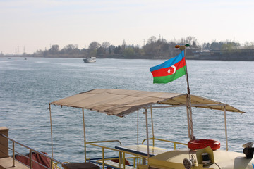 Boat on the River. Blue sky. Background.