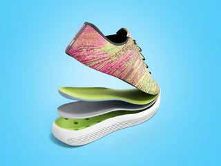 Fotobehang Pair of pink sport shoes by layers 3d render on blue background © nosorogua