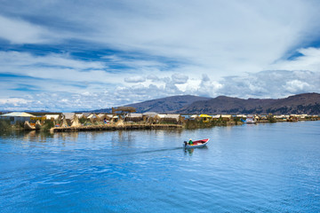 Fototapeta na wymiar Totora boat on the Titicaca lake near Puno, Peru
