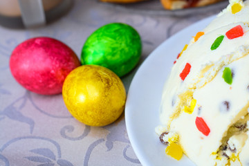 Bright colorful painted eggs on the table for Easter