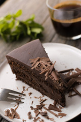 chocolate cake on wood background.