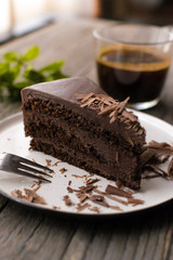 chocolate cake on wood background.