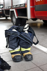 Firefighter Equipment Arranged At Fire Station