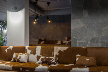 Animal printed sofa in lobby bar at winter resort