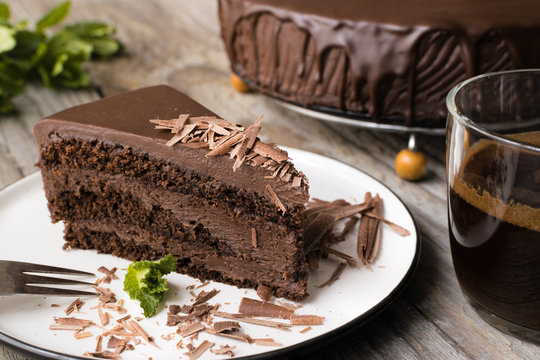 chocolate cake on wood background.