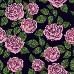 Embroidery seamless pattern texture, wallpaper, background with beautiful pink roses. Vector floral ornament on black background. Template for printing, textiles, design