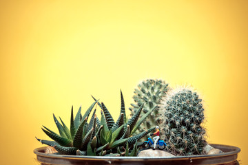 Miniature girl travelling on vintage motorcycle