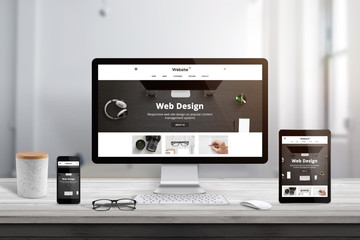 Modern web site flat design theme presentation on responsive display devices.