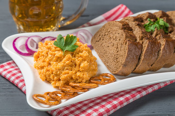 Traditional Bavarian beer snack obatzda Camembert cheese, onion, butter, and paprika