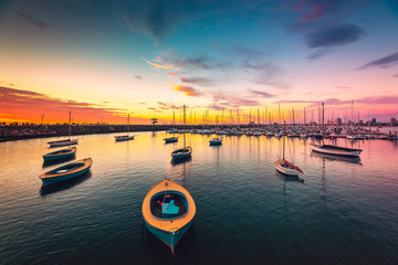 Yachts anchored in a row at sunset © myphotobank.com.au