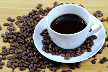 Coffee cup and coffee beans