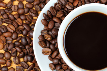 Coffee cup and coffee beans