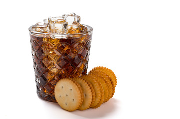 cup of iced cola and sandwich biscuits on white background with clipping path