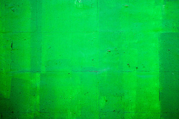 Fototapeta na wymiar Wall painted with bright green color