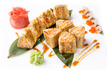 Sushi roll turned on a white background. Sushi Japanese food in a restaurant. Japanese restaurant menu. Roll in an omelette isolated on white background.
