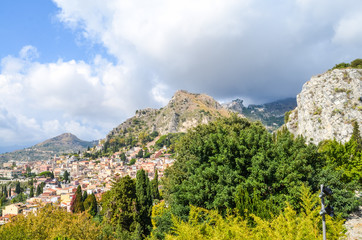 Sicilian lanscape with mountains and buildings