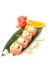 Appetizing sushi rolls with salmon and cream cheese Philadelphia on a white background. Japanese food. Isolated.