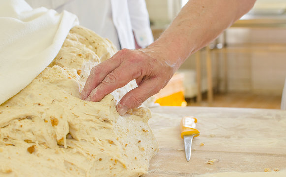 Preparing dough in a bakery.
